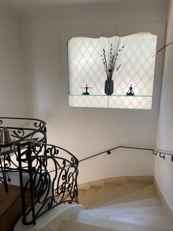 Ein Bett oder Betten in einem Zimmer der Unterkunft Villa Agrippa