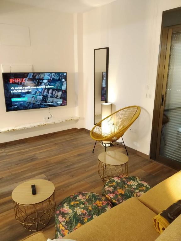 TV a/nebo společenská místnost v ubytování Mirador de Alcañiz