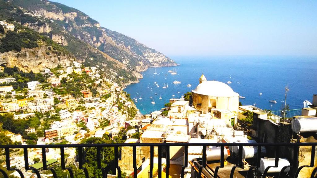 a view of the amalfi coast from a balcony at Casa Positamo in Positano