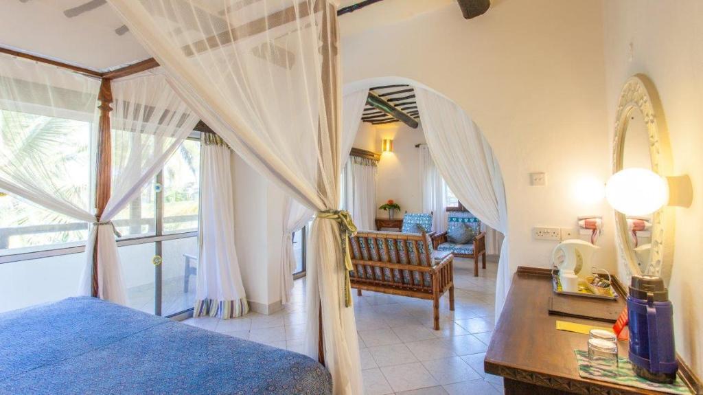 Postel nebo postele na pokoji v ubytování Turtle Bay Beach Club- All Inclusive