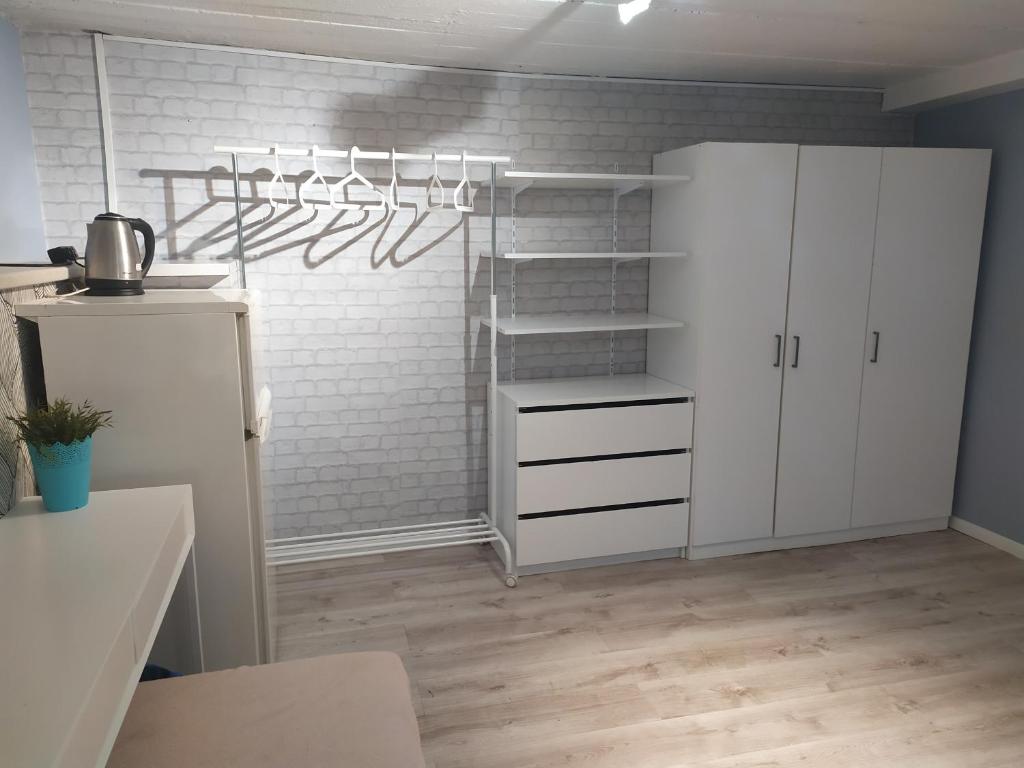 Kuchyň nebo kuchyňský kout v ubytování Olive Hostel