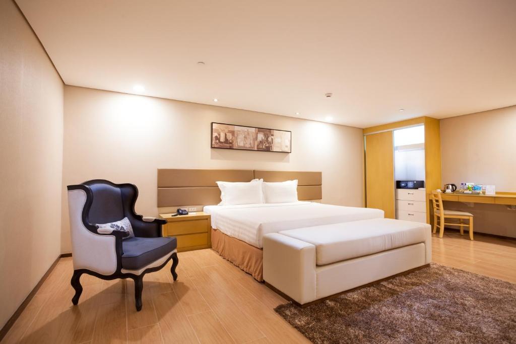 Postel nebo postele na pokoji v ubytování Jinjiang Inn - Makati