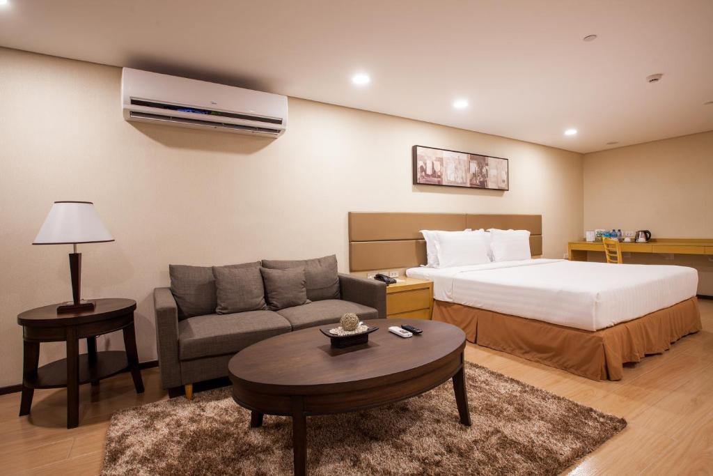 Postel nebo postele na pokoji v ubytování Jinjiang Inn - Makati