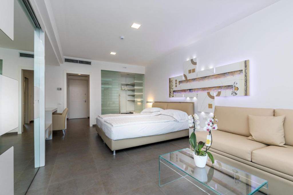 Postel nebo postele na pokoji v ubytování Hotel Vega
