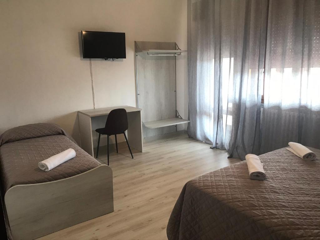 TV a/nebo společenská místnost v ubytování Albergo Ristorante Uspa