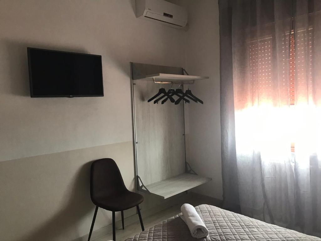 TV a/nebo společenská místnost v ubytování Albergo Ristorante Uspa