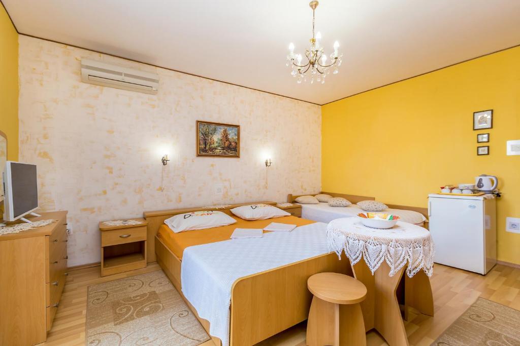 Postel nebo postele na pokoji v ubytování Soba 2