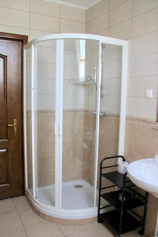 Koupelna v ubytování Hotel Alex