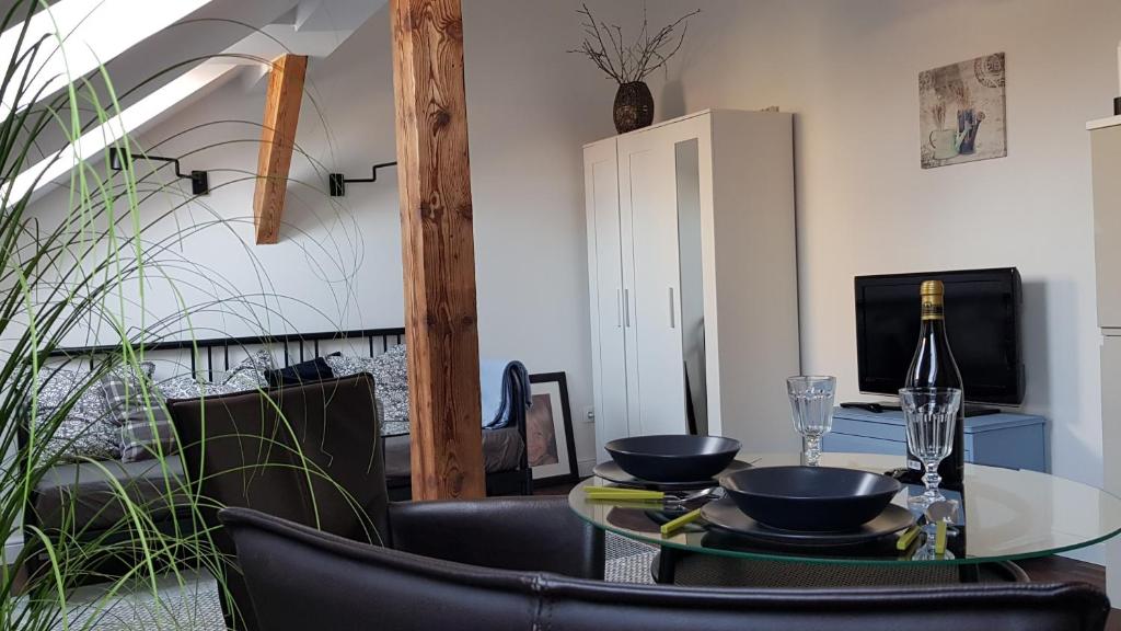 Televízia a/alebo spoločenská miestnosť v ubytovaní Boutique II.