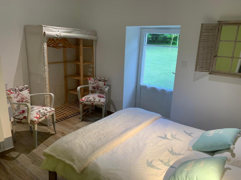 Chambres d'hôtes Logis Charrier Le Petit Bignon - Vierpersoonskamer