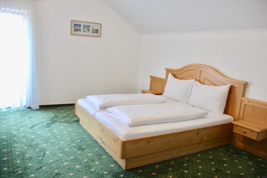 Postel nebo postele na pokoji v ubytování Hotel Alex
