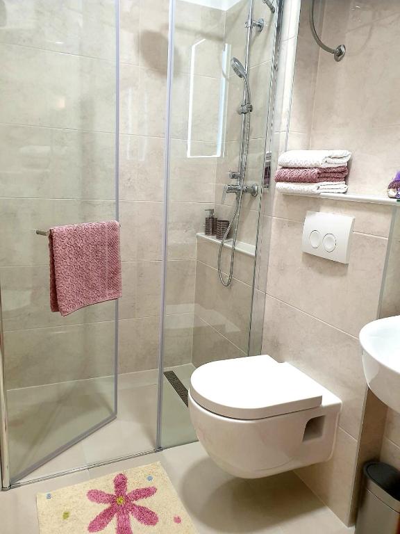 Kúpeľňa v ubytovaní Apartments Kuzmanic