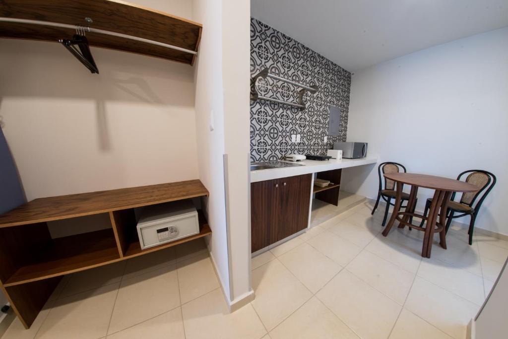 Kuchyň nebo kuchyňský kout v ubytování Hotel Clipperton