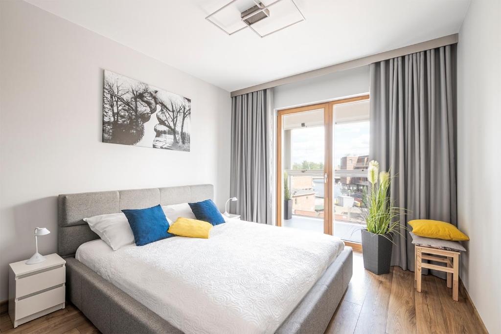 Postel nebo postele na pokoji v ubytování Dream4You Apartments