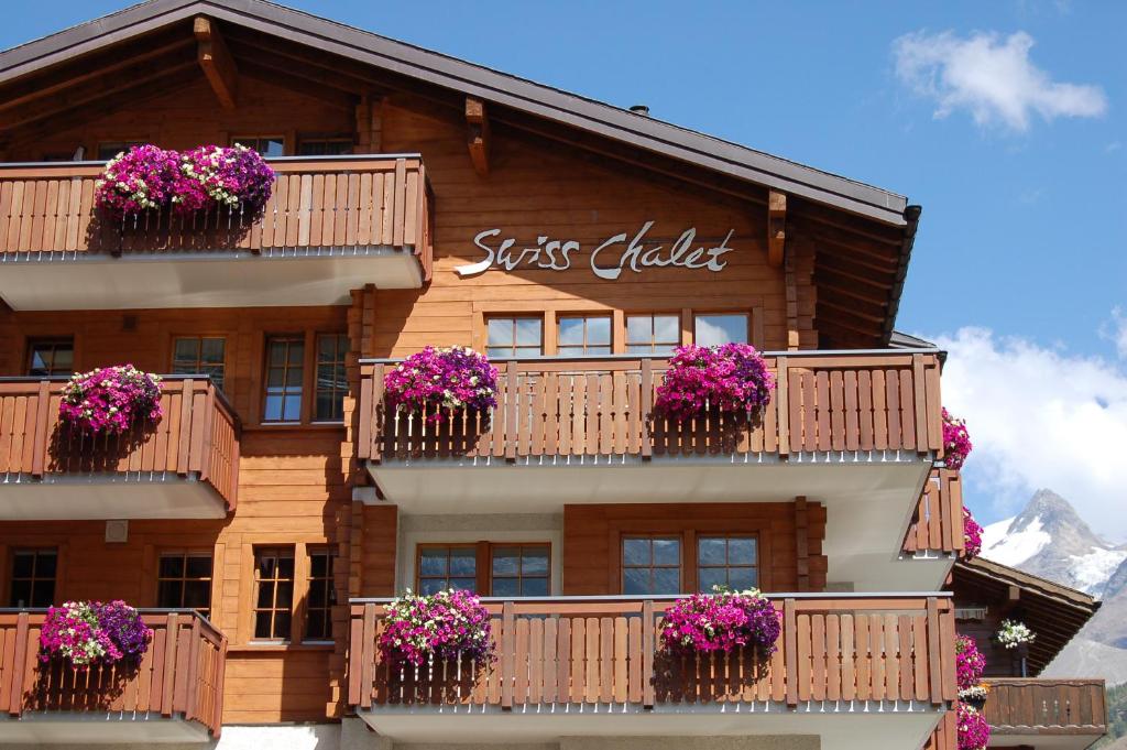 Balkón nebo terasa v ubytování Apartment Swiss Chalet