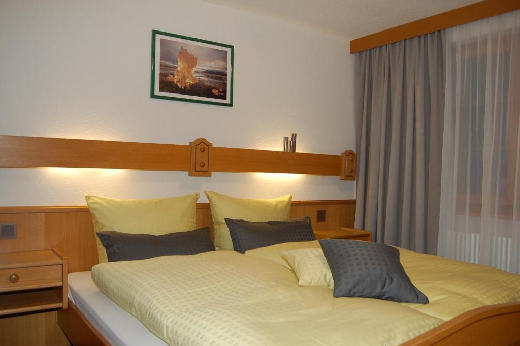 Postel nebo postele na pokoji v ubytování Apartment Swiss Chalet