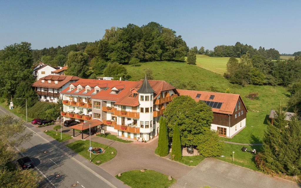 an aerial view of a large building on a hill at Landhotel Kühler Grund in Grasellenbach