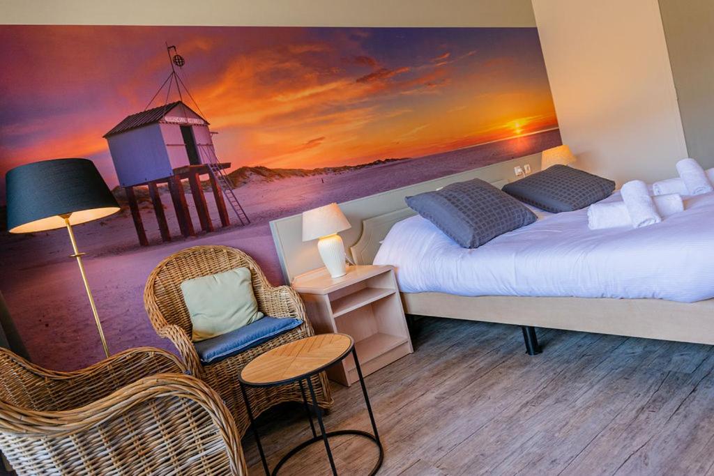 Postel nebo postele na pokoji v ubytování `t Wapen van Terschelling