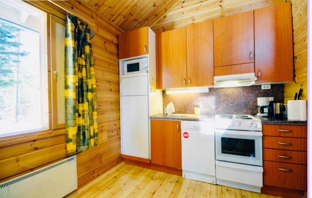 Kuchyň nebo kuchyňský kout v ubytování Holiday Home Marina