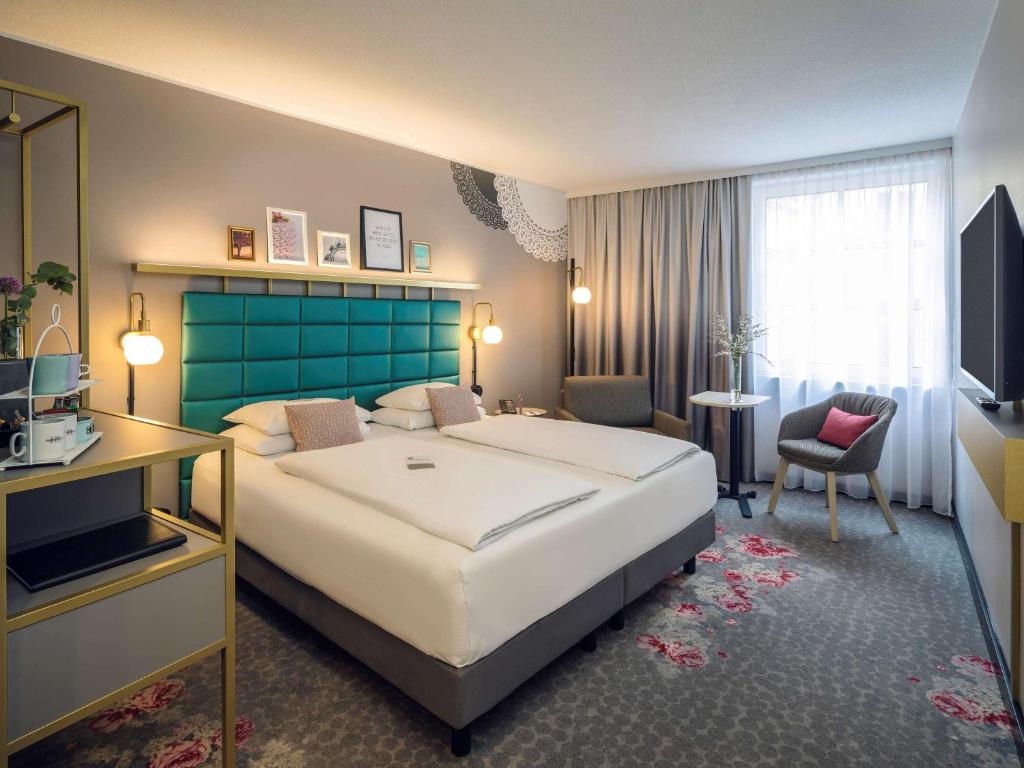 Postel nebo postele na pokoji v ubytování Mercure Wien Zentrum