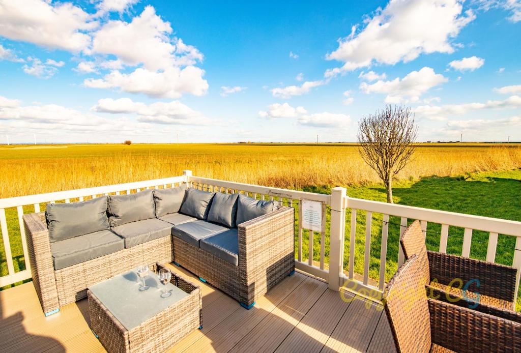 Гостиная зона в Sea 'n' Stars Platinum Plus Holiday home with Views, Free Wifi and Netflix