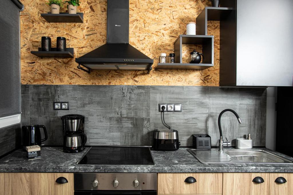 Kuchyňa alebo kuchynka v ubytovaní Thess Quality Urban Living