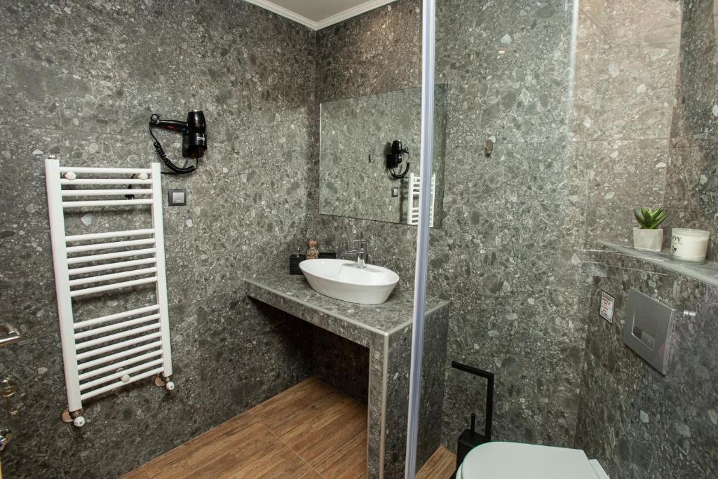 Kúpeľňa v ubytovaní Thess Quality Urban Living