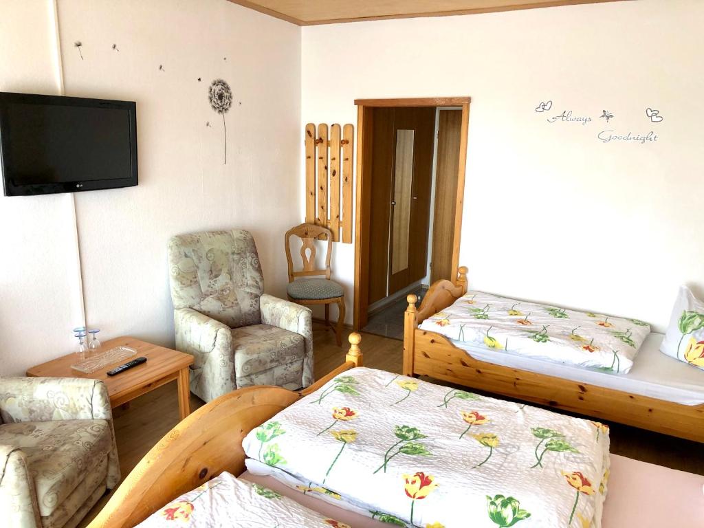 Postel nebo postele na pokoji v ubytování Hotel Charlott