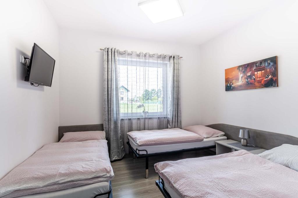 Postel nebo postele na pokoji v ubytování Motel OLIV