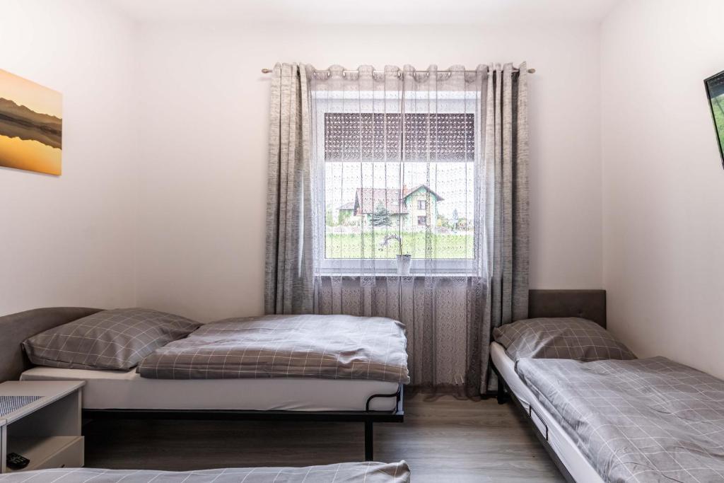 Postel nebo postele na pokoji v ubytování Motel OLIV