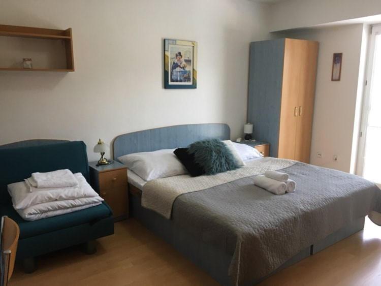 Postel nebo postele na pokoji v ubytování Guest House Maxim