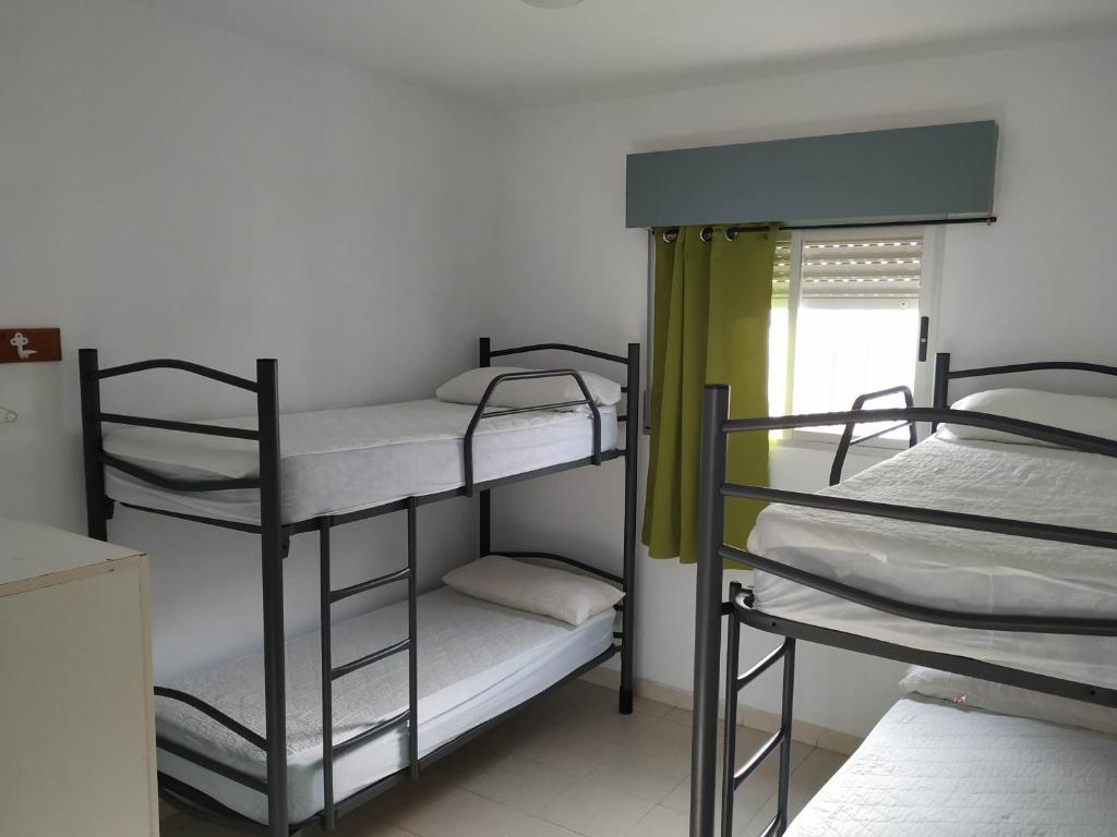 Posteľ alebo postele v izbe v ubytovaní Albergue de San Jose
