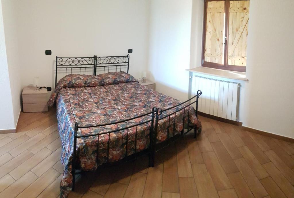 Postel nebo postele na pokoji v ubytování Locanda Dl'Angel