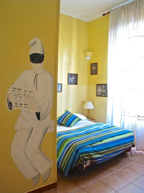 Łóżko lub łóżka w pokoju w obiekcie Chiaia B&B