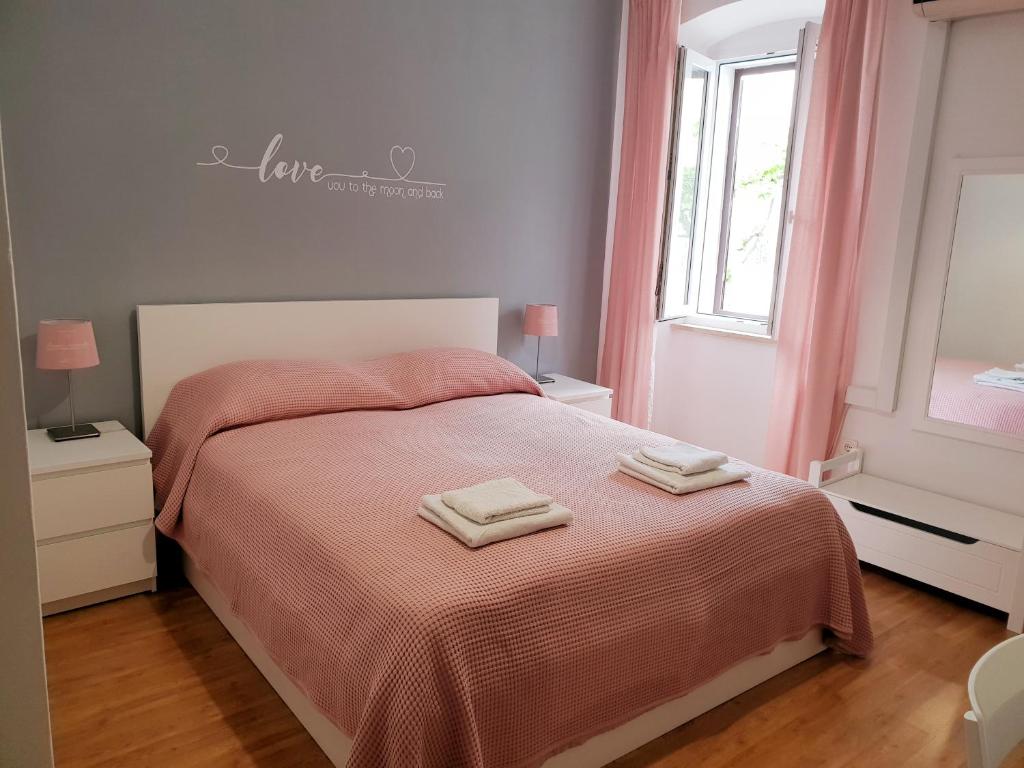 Un pat sau paturi într-o cameră la Guesthouse Fatuta