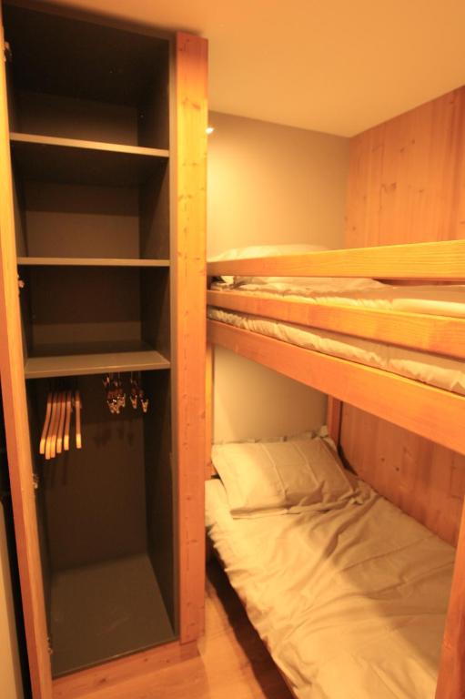Postel nebo postele na pokoji v ubytování L'Écrin Alpin - somptueux 4 pièces NEUF cœur station