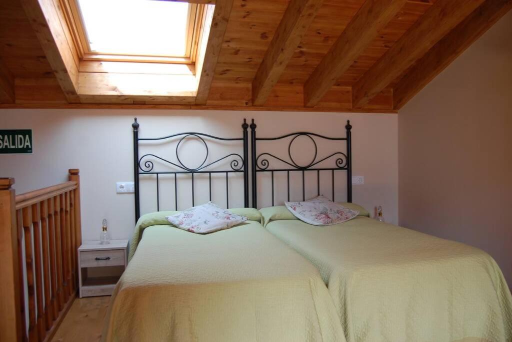 Postel nebo postele na pokoji v ubytování Gestiona2R - La Casina de Cirieñu, ideal para desconectar