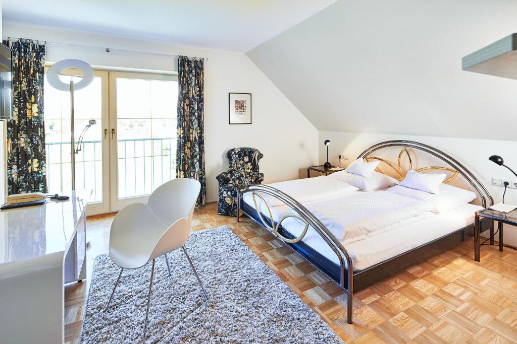 Postel nebo postele na pokoji v ubytování Reck's Hotel-Restaurant
