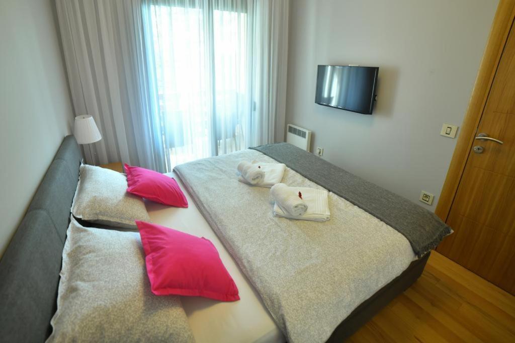 Postel nebo postele na pokoji v ubytování Apartman Silver Lux