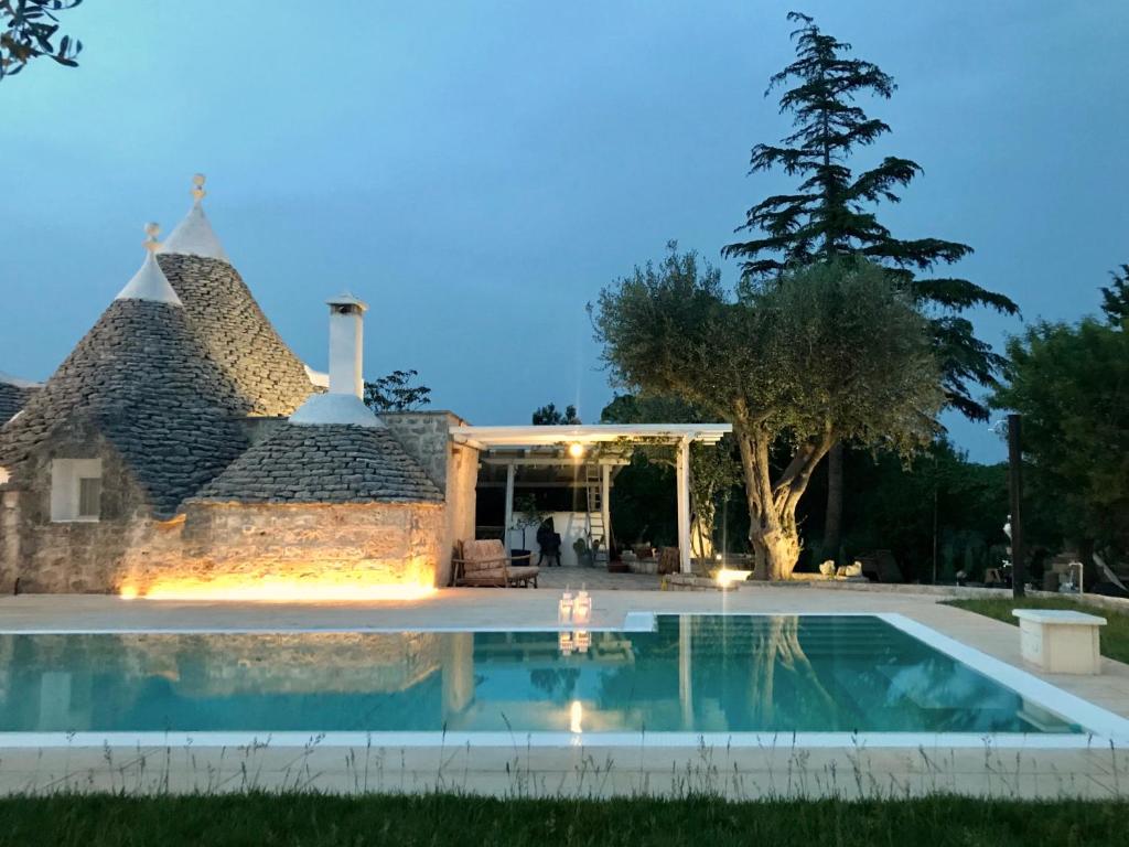 The swimming pool at or close to Trulli Storie di Puglia - Private Pool