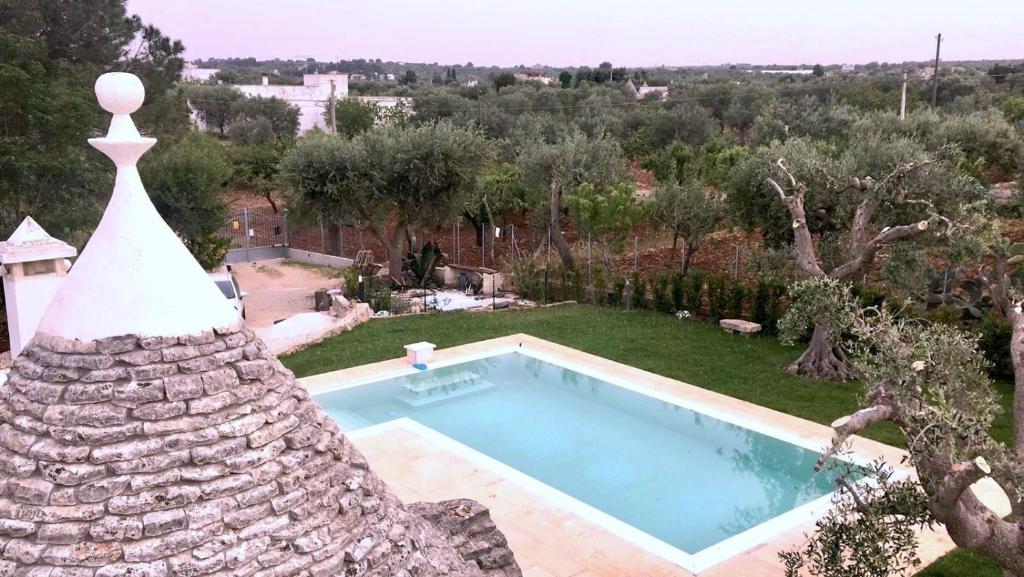 The swimming pool at or close to Trulli Storie di Puglia - Private Pool