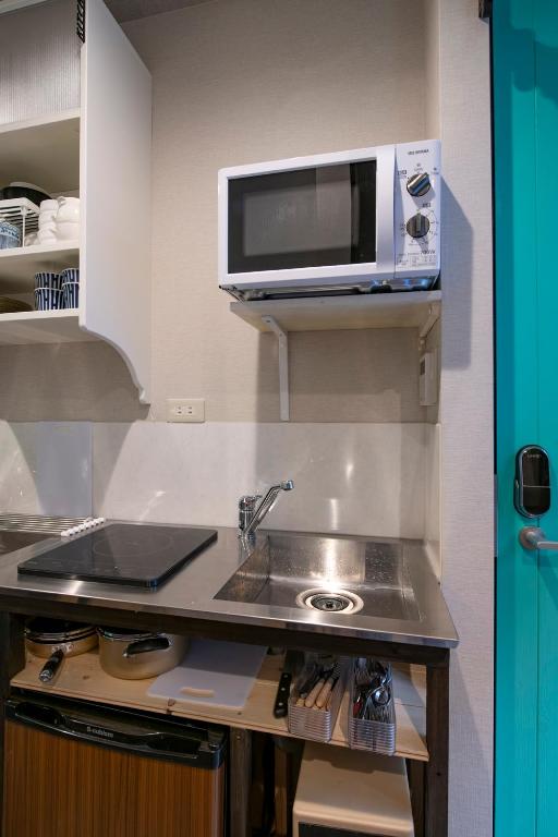 Kuchyň nebo kuchyňský kout v ubytování Room Inn Shanghai 横浜中華街 Room3