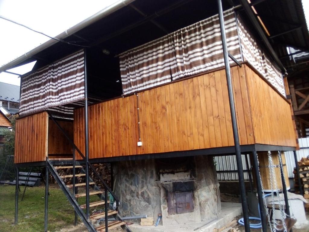 a house being constructed with a woodburning oven at Rukavychka in Yaremche