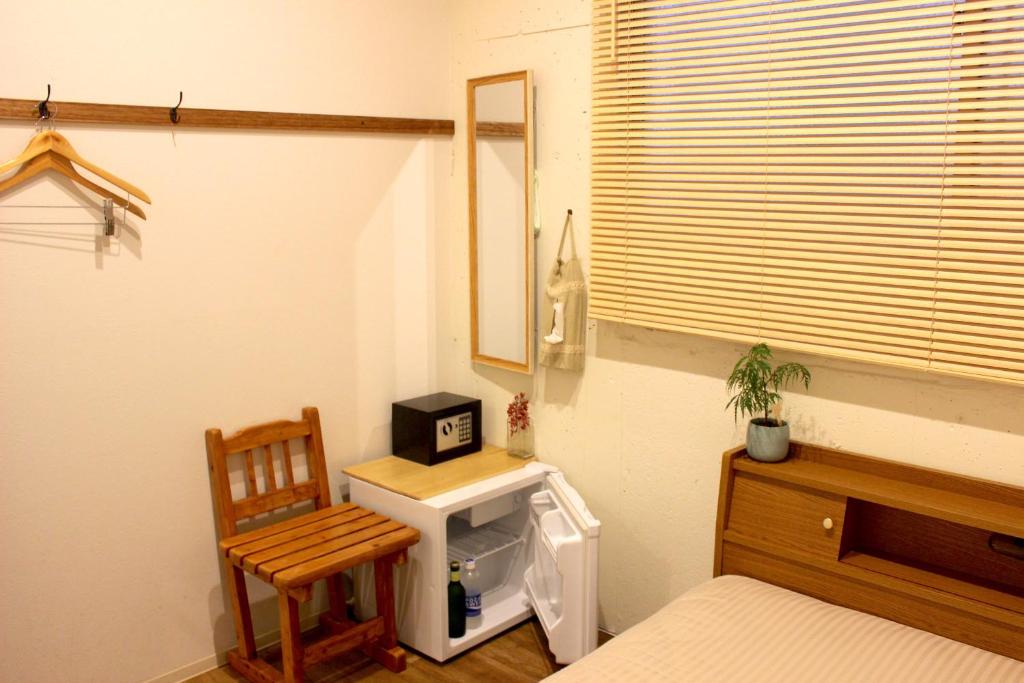 Postel nebo postele na pokoji v ubytování Hostel TOKI