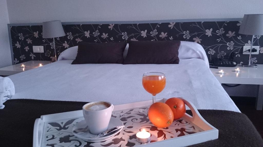 Postel nebo postele na pokoji v ubytování Hotel San Blas