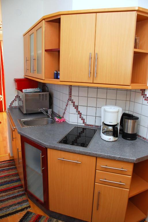 Kuchyň nebo kuchyňský kout v ubytování FeWo Wassertheurer