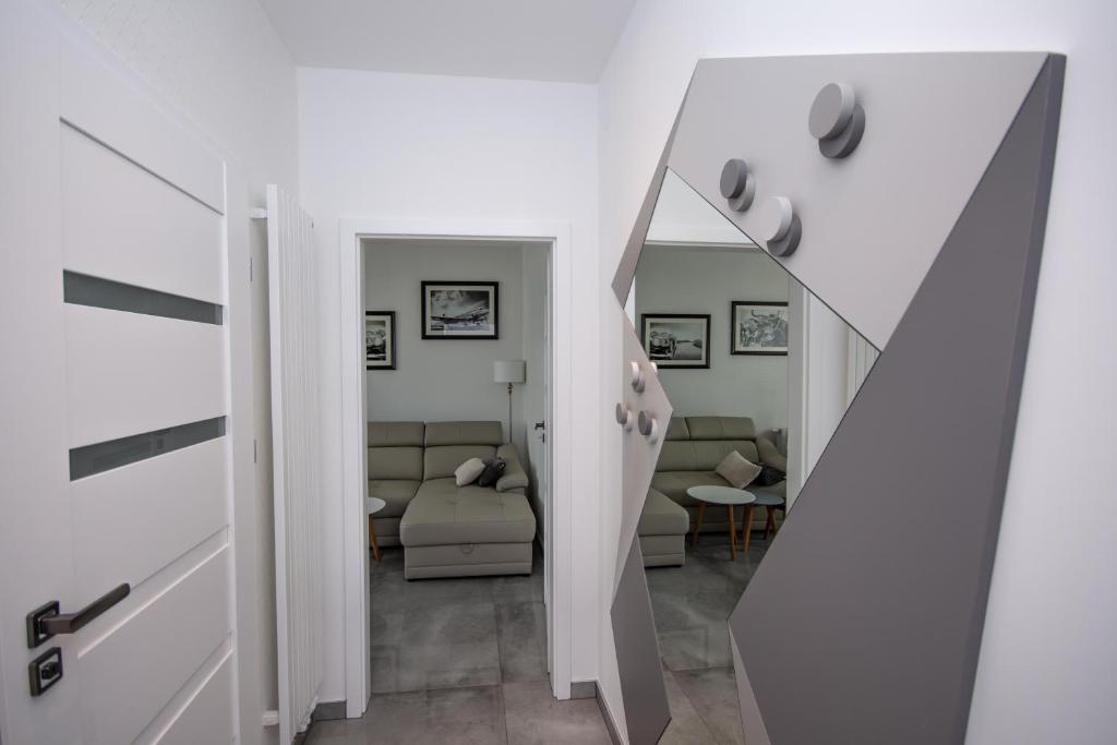 Posteľ alebo postele v izbe v ubytovaní Apartamenty AP 11