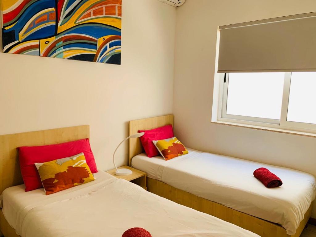 Postel nebo postele na pokoji v ubytování Hostel Malti Budget