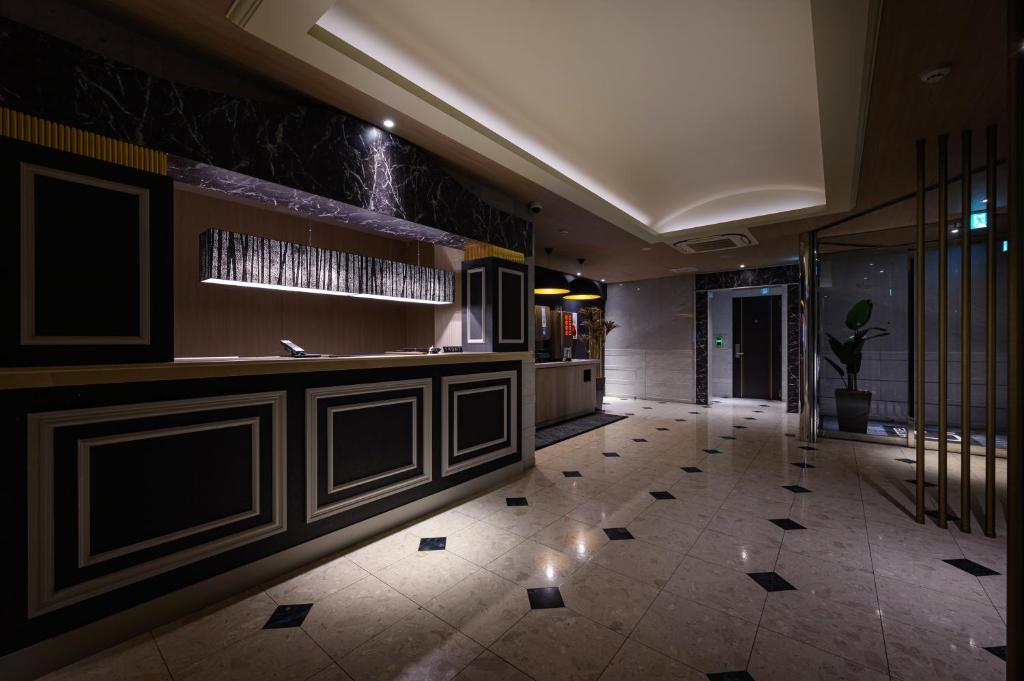 Kuchyň nebo kuchyňský kout v ubytování HOTEL C.KOHOKU
