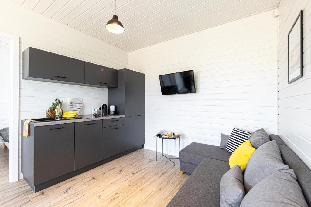 Kuchyň nebo kuchyňský kout v ubytování New Wave Resort Mielno
